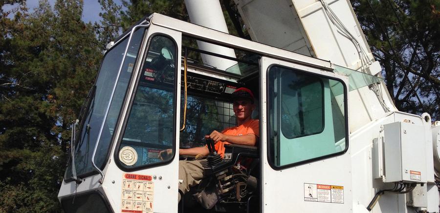 certified crane operator in 70 ton truck crane cab